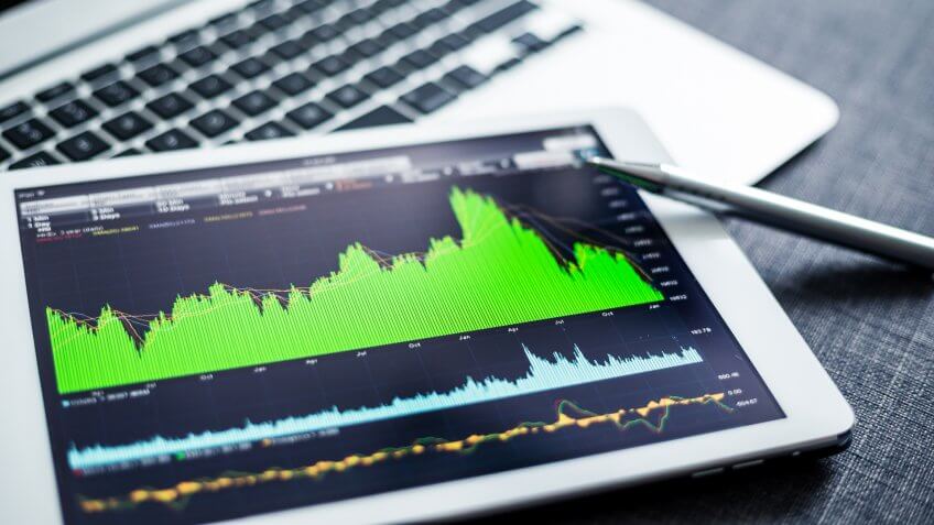 Stock market data analyzing on tablet pc.