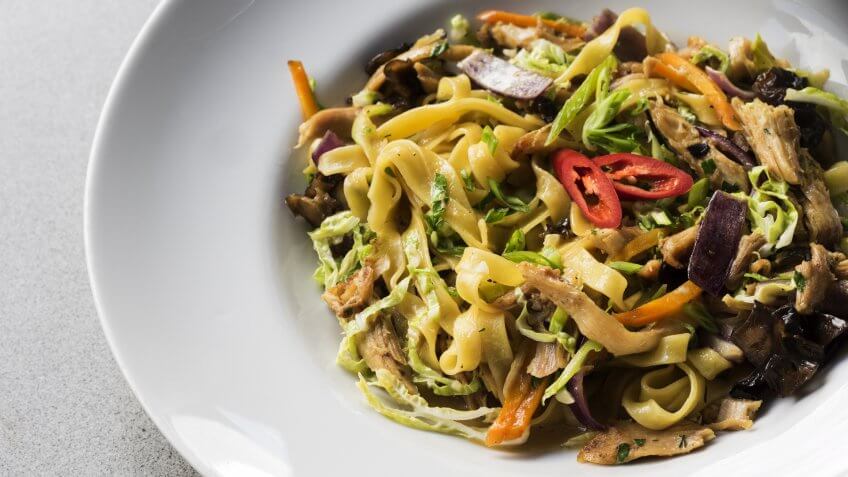 Noodles with bird meat and vegetables.