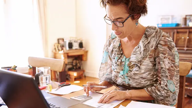 woman-using-calculator