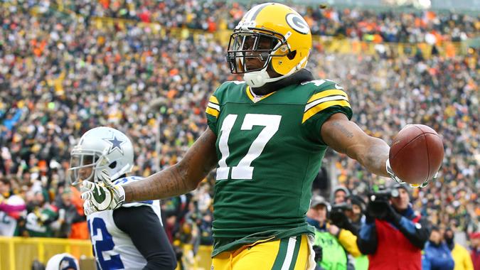 GREEN BAY, WI - JANUARY 11:   Davante Adams #17 of the Green Bay Packers reacts after scoring a touchdown in the third quarter against the Dallas Cowboys during the 2015 NFC Divisional Playoff game at Lambeau Field on January 11, 2015 in Green Bay, Wisconsin.
