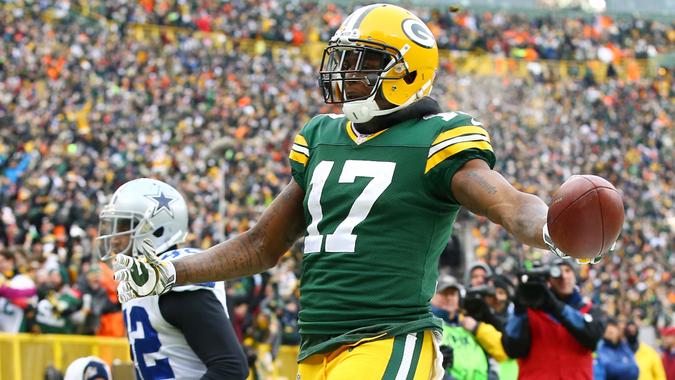 GREEN BAY, WI - JANUARY 11: Davante Adams #17 of the Green Bay Packers reacts after scoring a touchdown in the third quarter against the Dallas Cowboys during the 2015 NFC Divisional Playoff game at Lambeau Field on January 11, 2015 in Green Bay, Wisconsin.
