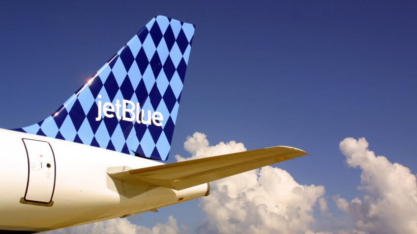 A JetBlue Airways jet sits on the tarmac June 19, 2001June 19, 2001 at the Ft.