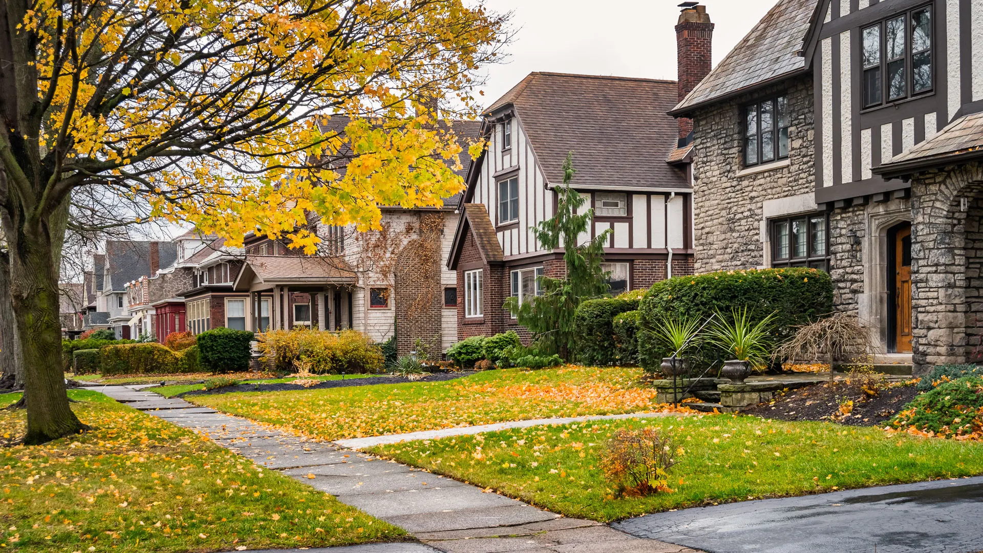 Photo of a row of homes in a residential district in downtown Niagara Falls, New York State, USA during Autumn.