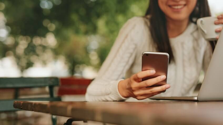 woman using smartphone