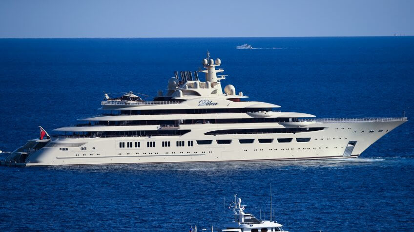 MONTE-CARLO, MONACO - APRIL 20: The worlds biggest yacht The Dilbar owned by Alisher Usmanov sails by the Monte Carlo Country Club on day five of the Monte Carlo Rolex Masters at Monte-Carlo Sporting Club on April 20, 2017 in Monte-Carlo, Monaco.