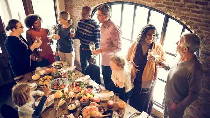 People Celebrating Thanksgiving Holiday Tradition Concept.