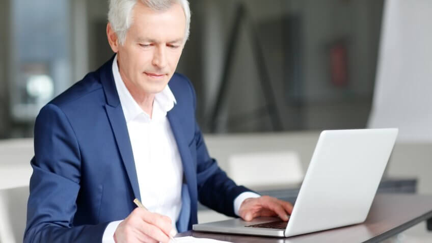 executive businessman working on his laptop