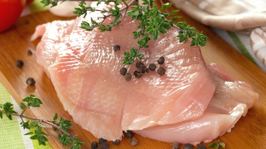 fresh poultry with pepper and thyme.