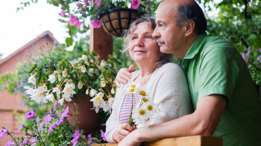 senior couple front porch