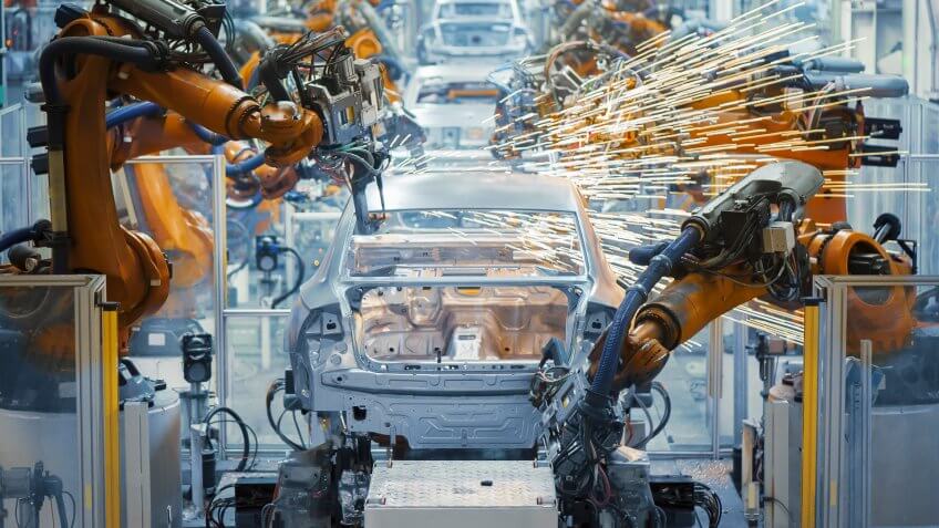 automobiles in a factory production line
