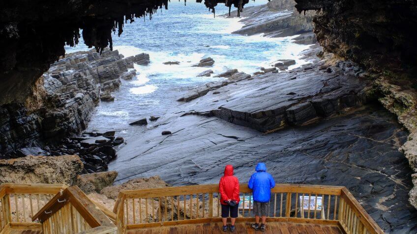 Tourists visit the cave of Admirals Arch on Kangaroo Island, South Australia.