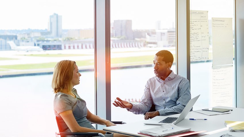 colleagues having a meeting in an office