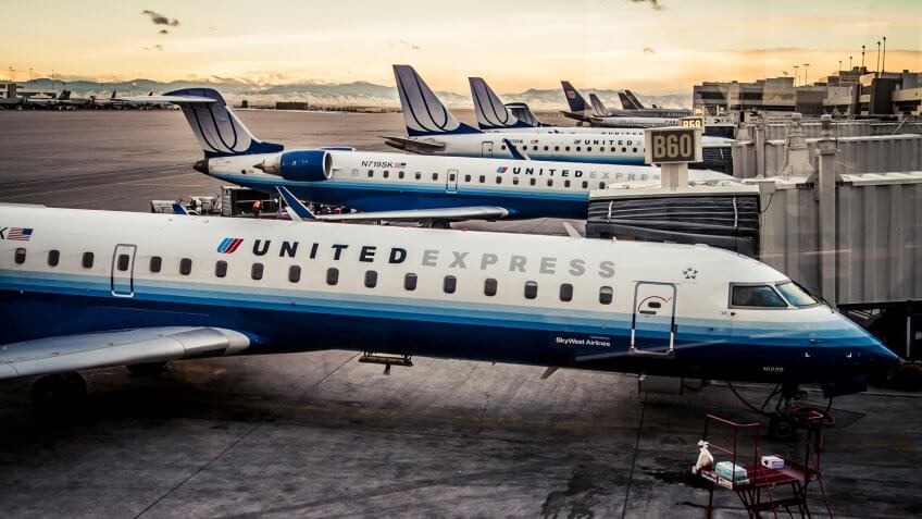 Denver, Colorado - 23 December, 2007: United Express CRJ-700 planes at gates at Denver International Airport.