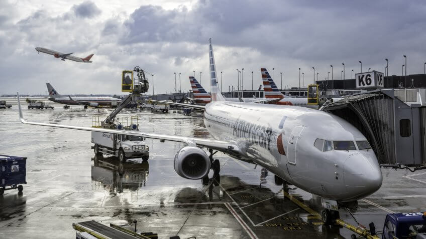 CHICAGO,UNITED STATES - JANUARY 22: Deicing of the American Airlines planes before take off on January 22, 2016 in Chicago.
