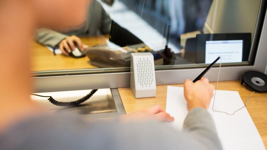filling out a bank slip