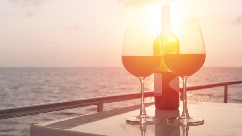 Romantic luxury evening on cruise yacht with winery setting.
