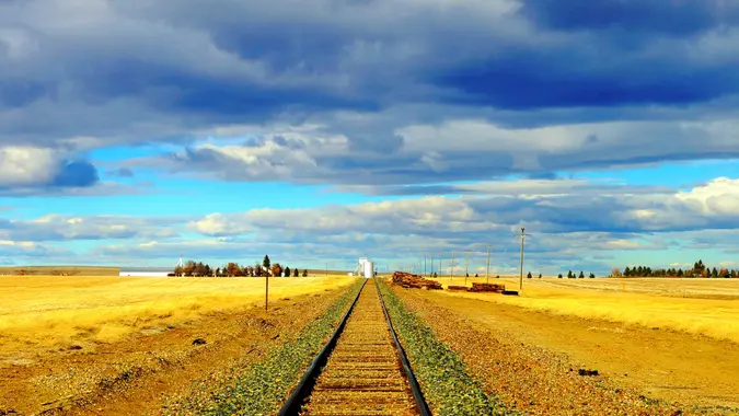 Railroad tracks in field