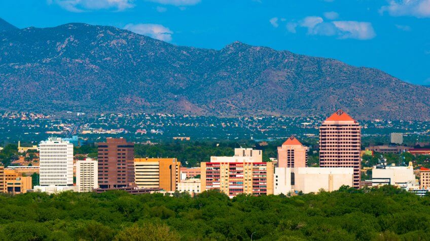 Albuquerque downtown skyline with the Sandia Mountains in the background. Albuquerque downtown skyline with the Sandia Mountains in the background.