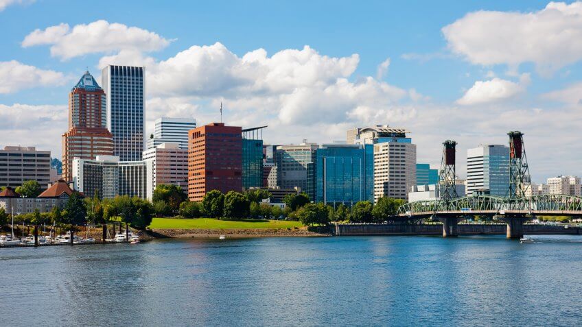 Skyscrapers next to a river in Portland. Skyscrapers next to a river in Portland.