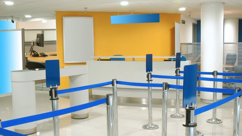 Waiting line lobby in bank interior.