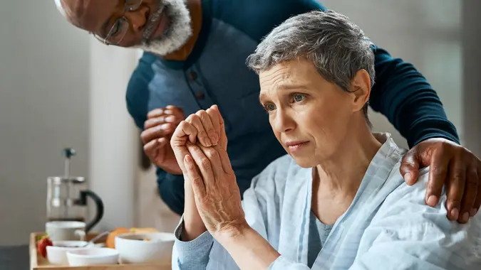 Shot of a senior married couple stressed out doing their budget at home.
