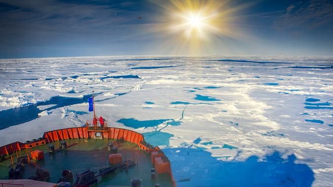 North pole - 2 July 2016: icebreaker makes its way to North pole through pack ice.