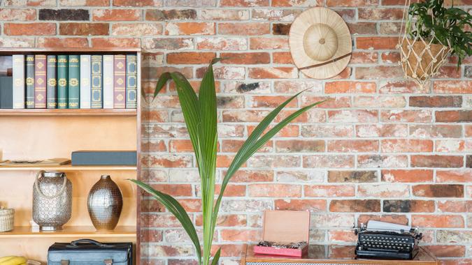Flat with wooden furniture and stylish antiques.