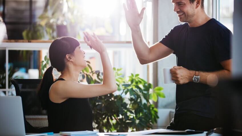 high five coworkers