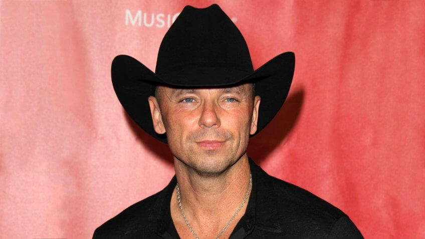 Kenny Chesney arrives at the 2013 MusiCares Person Of The Year Gala Honoring Bruce Springsteen at the Los Angeles Convention Center on February 8, 2013 in Los Angeles, CA.