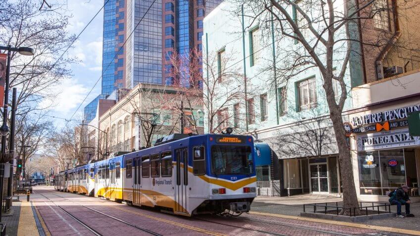 SACRAMENTO, CALIFORNIA - MARCH 5, 2017: Light rail train passing through downtown Sacramento, California.