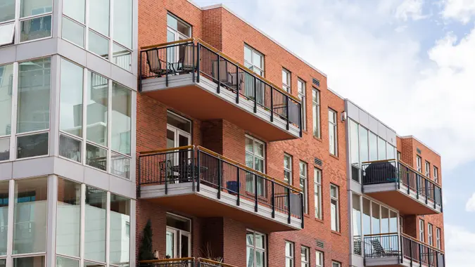 A row of condominium homes in stock photo to showcase homebuying, real estate and general housing market coverage.