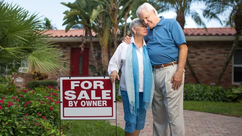 Senior couple selling their big house