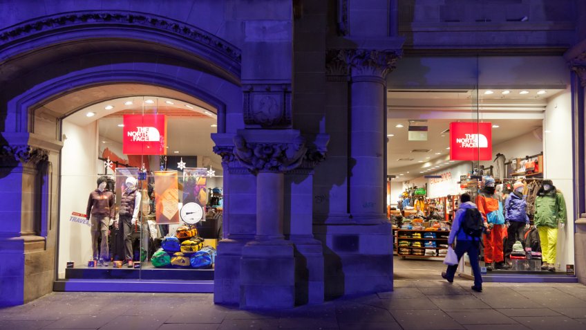"Glasgow, Scotland, UK - 18th November, 2012: A shopper walks into The North Face shop in Buchanan Street, Glasgow.