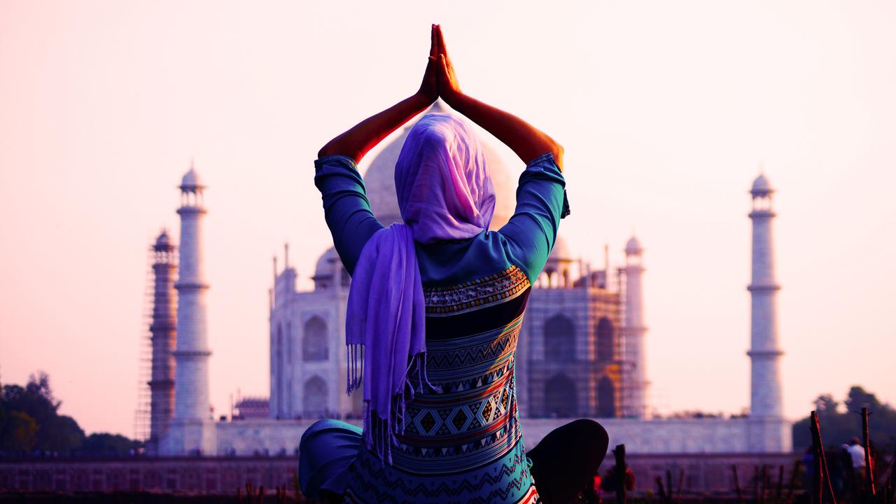 woman doing yoga pose in India