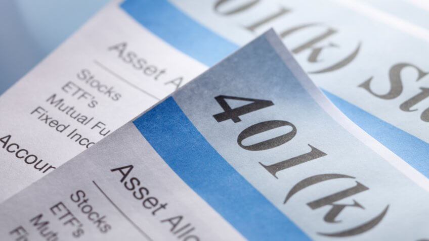 A stack of retirement account statements.