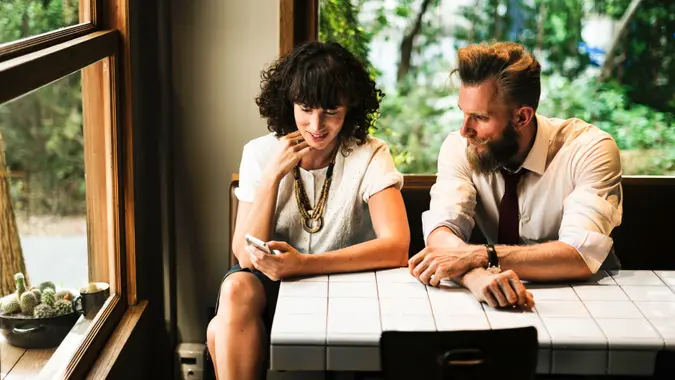 couple looking at a smartphone
