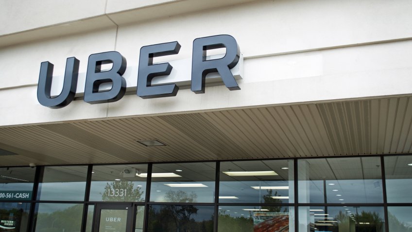 Uber Office, Oak Park, Michigan, USA - May 1, 2017:Exterior view of an Uber Office and it's sign, May 1, 2017, Oak Park, Michigan USA.