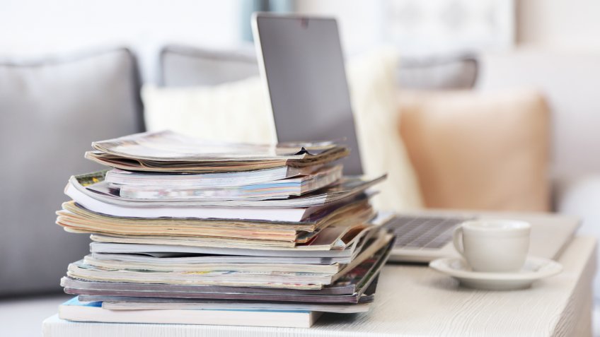 catalogs, laptop, living room, magazines