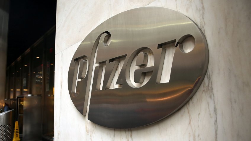 NEW YORK, NY - NOVEMBER 12: Pfizer's corporate headquarters stand in midtown Manhattan on a morning wherevolunteers with Doctors Without Borders dumped $17 million in fake money outside of the building to protest high vaccine prices on November 12, 2015 in New York City.