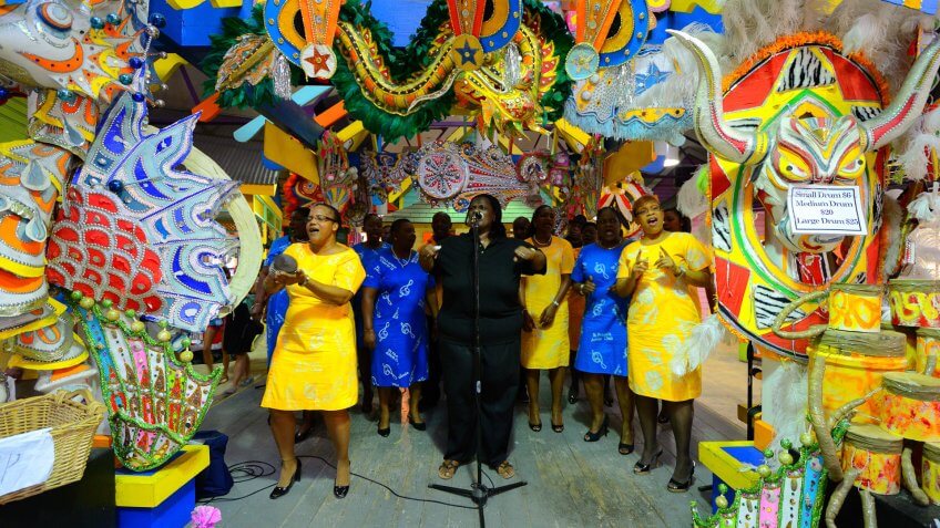 NASSAU - JANUARY 1: Gospel singers in Junkanoo fashion welcome visitors to the port January 1, 2012 in Nassau, Bahamas. Junkanoo parades are unique to Bahamian culture and occur on New Years Day.