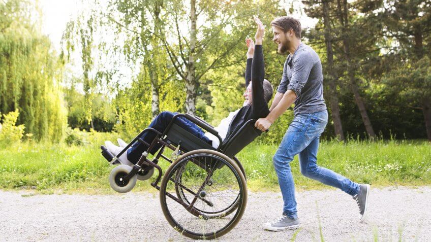senior-disabled-man-with-grandson