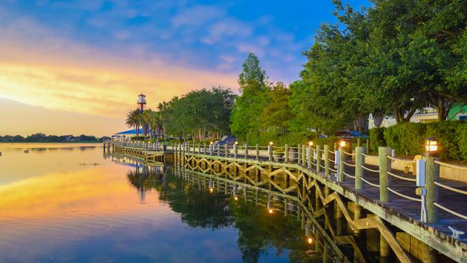 Sunset on the boardwalk on the waterfront at The Villages, Florida.