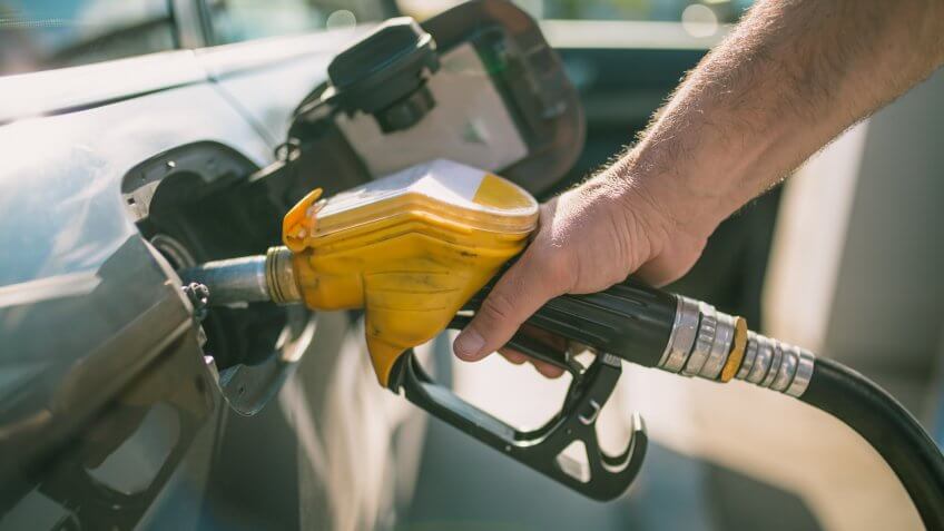 Car refueling on petrol station.