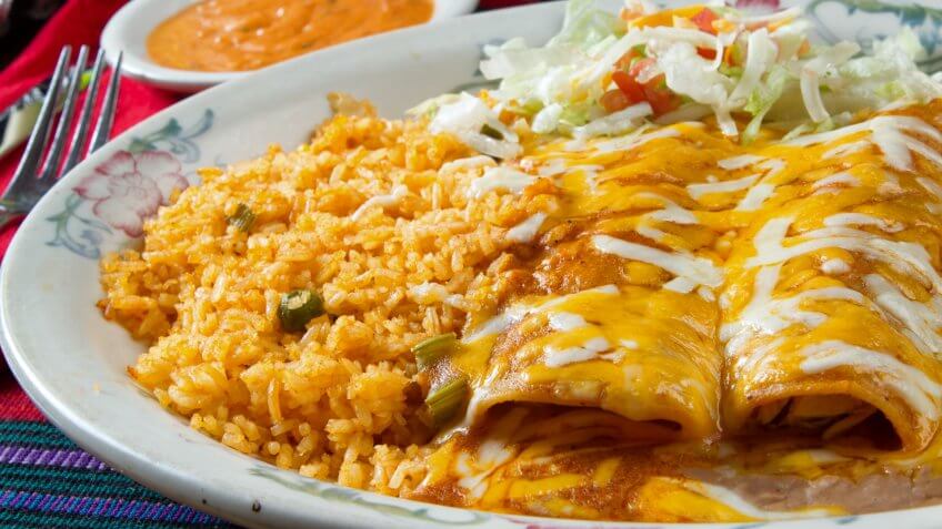 Hot, gooey and cheesy cheese enchiladas in a Mexican restaurant.
