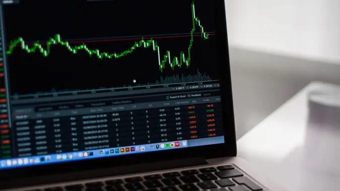 interest rate, laptop, stocks