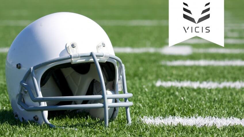 football helmet sitting on the field