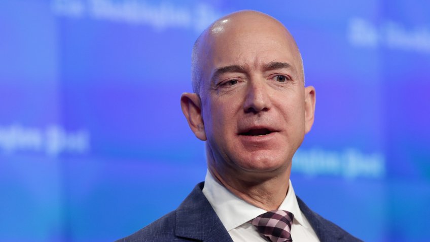 WASHINGTON, DC - JANUARY 28: Amazon founder and Washington Post owner Jeff Bezos delivers remarks during the opening ceremony of the media company's new location January 28, 2016 in Washington, DC.