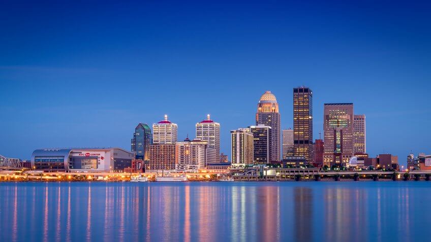 looking across the river just after sunset at the Louisville, Kentucky skyline.