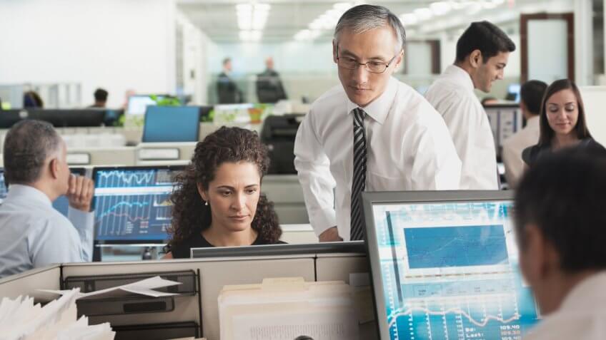 Business people working together in office.