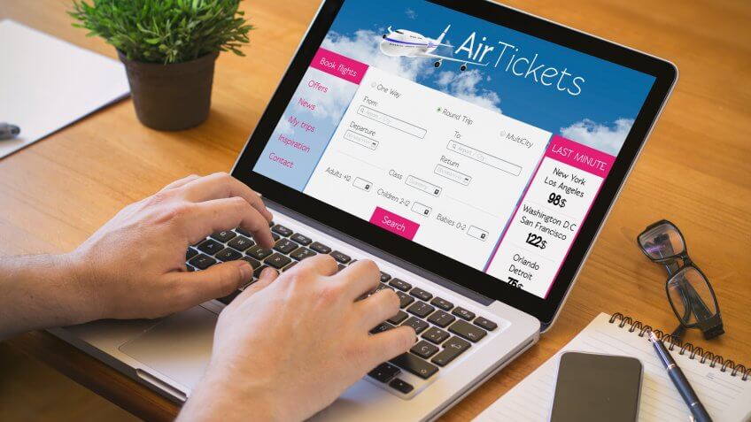 Travel, airline tickets, booking, laptop, reservation